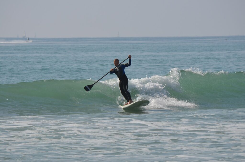 stand up paddle surfing, standup paddleboarding, man-360961.jpg