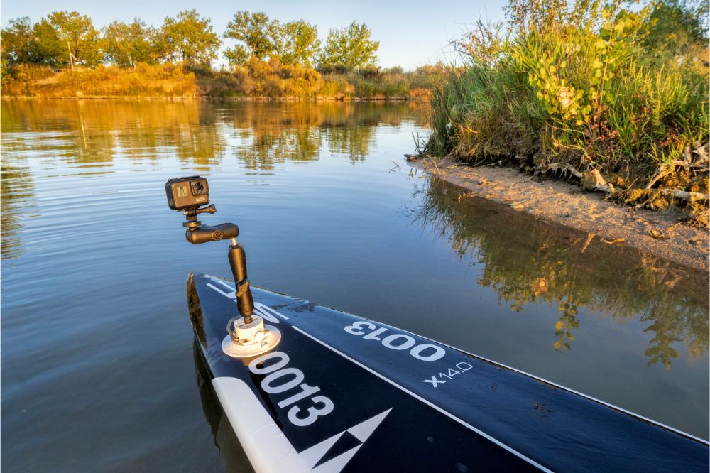 GoPro Hero 7 action camera on SUP used in an article about the best GoPro for Water Activities