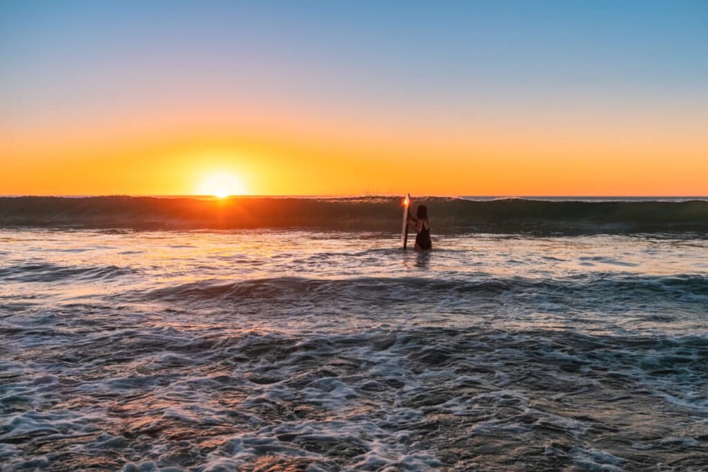 Bodyboarder waiting for a wave in an article about how to Drop Knee Bodyboard