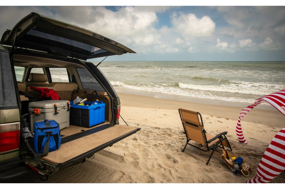 cooler box and bag in a trunk