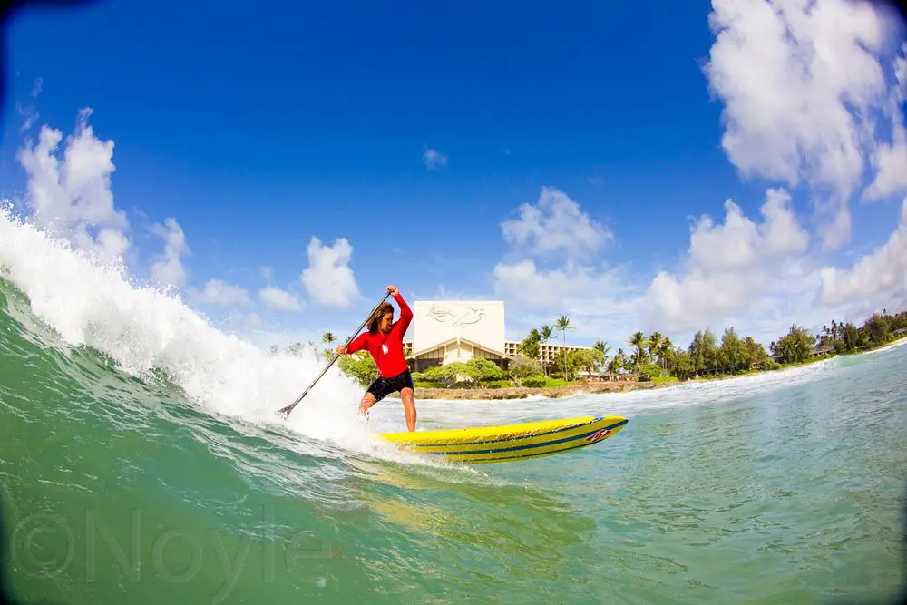 Stand Up Paddle Boarder riding a wave, Wave SUP, Wave Stand Up Paddle Boarding, Photo by @Noyle