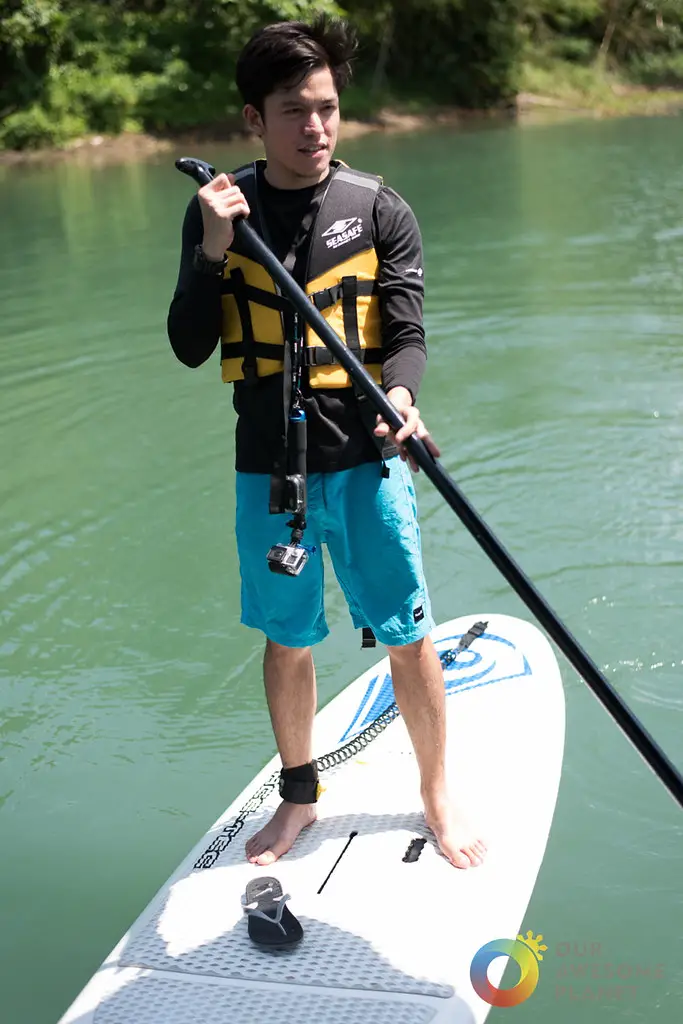 Man on a Stand Up Paddle Board using the Parallel Stance Position. Photo by OURAWESOMEPLANET PHILS 1 FOOD AND TRAVEL BLOG