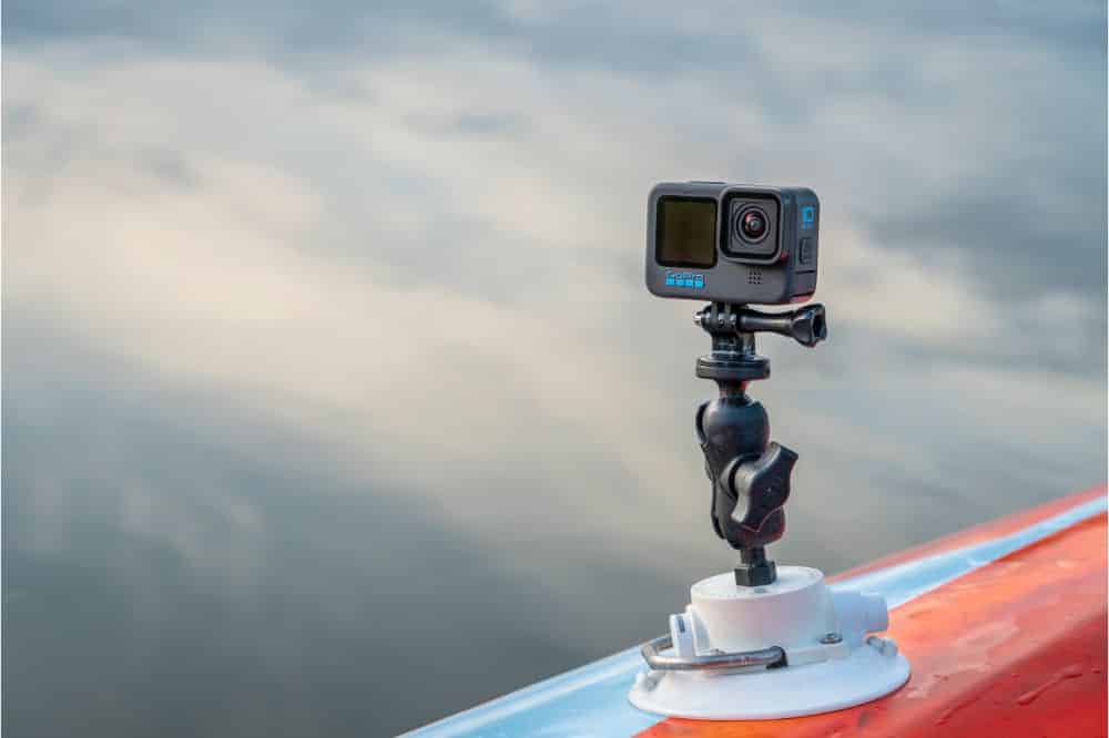 GoPro Hero 10 waterproof action camera mounted on paddleboard