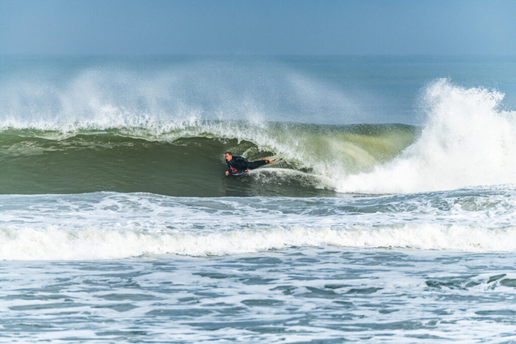 Bodyboarder riding a wave