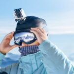 Skier with action camera on a helmet