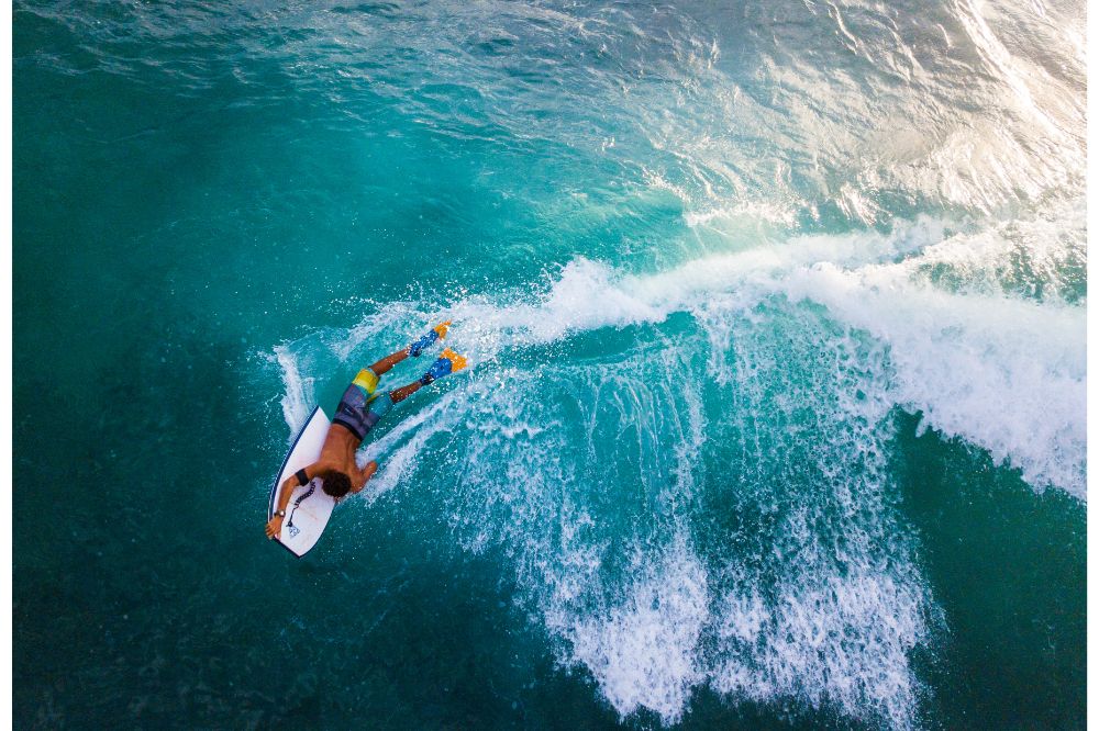 Boogie boarder riding a huge wave