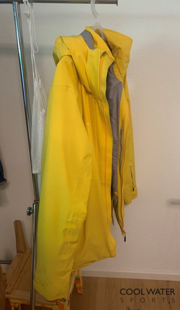 Ski Jacket hanging on a dry place for drying after washing, picture showing how to store ski clothes correctly